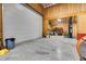 Large garage with roll-up door and storage shelving at 350 Taylor Path, Dallas, GA 30157