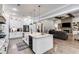 Open concept kitchen with island, white cabinets, and view of living room at 350 Taylor Path, Dallas, GA 30157