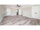 Large bedroom with vinyl flooring, ceiling fan and ample closet space at , Loganville, GA 30052