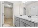 Double vanity bathroom with adjacent closet at 2570 Bayrose Cir, Atlanta, GA 30344