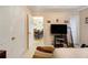 Bedroom with a view of the dining area and a TV stand at 303 Breezy Hill Walk, Stockbridge, GA 30281