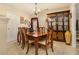 Dining room with wood table and hutch at 303 Breezy Hill Walk, Stockbridge, GA 30281