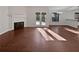 Empty living room featuring natural light and a fireplace at 2268 Turtle Club Ne Dr, Marietta, GA 30066