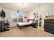 Bedroom with a double bed and plenty of natural light at 4851 Planters Walk, Douglasville, GA 30135