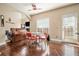 Breakfast nook with hardwood floors, a round table, and red chairs at 4851 Planters Walk, Douglasville, GA 30135