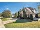 Beautiful home with mature trees and a well-manicured lawn at 4851 Planters Walk, Douglasville, GA 30135