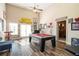 Game room features a pool table, bar area, and access to a home theatre at 4851 Planters Walk, Douglasville, GA 30135