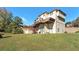 Two story home with large deck and grassy backyard at 4851 Planters Walk, Douglasville, GA 30135