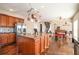 Spacious kitchen with island, stainless steel appliances, and hardwood floors at 4851 Planters Walk, Douglasville, GA 30135