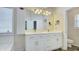 Bathroom with double vanity and updated fixtures at 729 River Bridge Dr, Lawrenceville, GA 30046