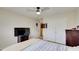 Bedroom with a full-size bed and double door closet at 729 River Bridge Dr, Lawrenceville, GA 30046