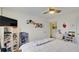 Bedroom with a queen-size bed and built-in shelving at 729 River Bridge Dr, Lawrenceville, GA 30046