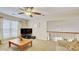 Spacious bonus room with TV, couch, and loft view at 729 River Bridge Dr, Lawrenceville, GA 30046