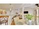 Breakfast area with glass table and view into living room and kitchen at 729 River Bridge Dr, Lawrenceville, GA 30046