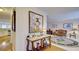 Bright entryway with hardwood floors, granite console table, and views to living room and kitchen at 729 River Bridge Dr, Lawrenceville, GA 30046