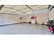 Two-car garage with epoxy floor and storage at 729 River Bridge Dr, Lawrenceville, GA 30046