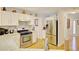 Modern kitchen with stainless steel appliances and granite countertops at 729 River Bridge Dr, Lawrenceville, GA 30046