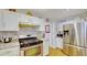 Bright kitchen, featuring stainless steel appliances and granite countertops at 729 River Bridge Dr, Lawrenceville, GA 30046