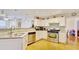 Kitchen with granite countertops, stainless steel appliances, and white cabinets at 729 River Bridge Dr, Lawrenceville, GA 30046