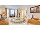 Spacious living room with hardwood floors, bay window, and comfortable seating at 729 River Bridge Dr, Lawrenceville, GA 30046