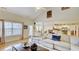 Open living area with hardwood floors and views into the kitchen at 729 River Bridge Dr, Lawrenceville, GA 30046