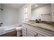 Bathroom with granite countertop and a shower/tub at 1326 Elm Cir, Stockbridge, GA 30281