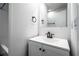 Clean bathroom with white vanity and updated fixtures at 1326 Elm Cir, Stockbridge, GA 30281