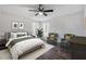 Main bedroom with two armchairs and a ceiling fan at 1326 Elm Cir, Stockbridge, GA 30281