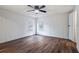 Well-lit bedroom with wood flooring and two windows at 1326 Elm Cir, Stockbridge, GA 30281