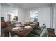 Open concept dining room with view into living room and kitchen at 1326 Elm Cir, Stockbridge, GA 30281