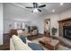 Bright and airy living room with hardwood floors and a cozy fireplace at 1326 Elm Cir, Stockbridge, GA 30281