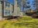 Spacious backyard with a deck and a view of neighboring houses at 601 Ashton Ln, Lawrenceville, GA 30044