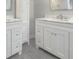 Double sink bathroom vanity with marble countertop at 601 Ashton Ln, Lawrenceville, GA 30044