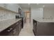 Modern kitchen with granite countertops and stainless steel appliances at 601 Ashton Ln, Lawrenceville, GA 30044