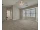 Large main bedroom with carpeting and ensuite bath at 601 Ashton Ln, Lawrenceville, GA 30044