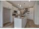 Modern kitchen with white cabinets, granite countertops and stainless steel appliances at 96 Rome St, Temple, GA 30179