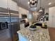 Close up view of the kitchen island with granite countertop and modern black faucet at 96 Rome St, Temple, GA 30179
