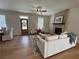 Living room with a brick fireplace, comfortable seating, and access to dining area at 96 Rome St, Temple, GA 30179