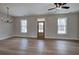 Spacious living room with hardwood floors and lots of natural light at 96 Rome St, Temple, GA 30179