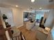 Upstairs view of the open concept living room with kitchen, living room, and dining area at 96 Rome St, Temple, GA 30179