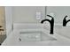 Modern bathroom sink with black faucet and white countertop at 111 Cassville-White, Cartersville, GA 30121