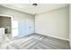 Spacious bedroom with double doors and gray carpeting at 111 Cassville-White, Cartersville, GA 30121