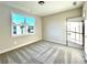 Well-lit bedroom with gray carpeting and a large window at 111 Cassville-White, Cartersville, GA 30121