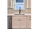 Modern kitchen sink with white shaker cabinets and black faucet at 111 Cassville-White, Cartersville, GA 30121