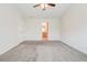 Bright bedroom featuring carpet, ceiling fan and access to bathroom at 2429 Sardis Chase Ct, Buford, GA 30519