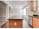 Kitchen island with granite countertop and wood cabinets at 2429 Sardis Chase Ct, Buford, GA 30519