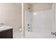 Bathroom with shower/tub combo, toilet and granite vanity at 3807 Lockaby Way, Lawrenceville, GA 30044