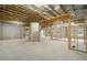 Unfinished basement with high ceilings and ample space at 420 Silver Brook Dr, Woodstock, GA 30188