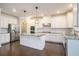 Modern kitchen with white cabinets, granite counters and island at 420 Silver Brook Dr, Woodstock, GA 30188