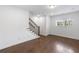 Finished basement with hardwood floors and a window for natural light at 4223 Deming Cir, Atlanta, GA 30342